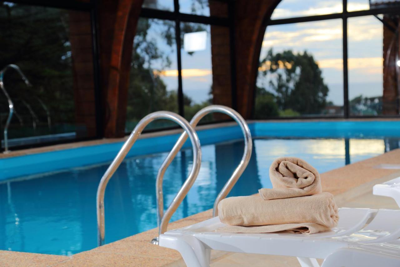 Cabanas Y Spa Costa Patagonia - Piscina Climatizada ピチレム エクステリア 写真